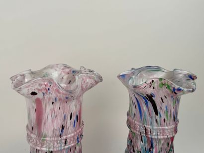 Two baluster vases with torsos and wavy necks...