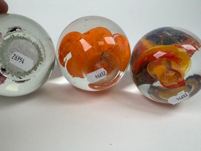 Three sulfur balls or paperweights in colored...