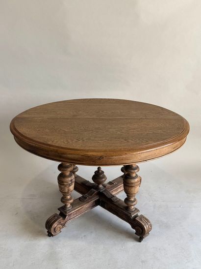 Large molded oak pedestal table on casters.
Henry...