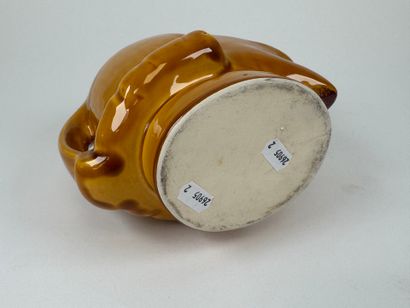 Yellow-glazed earthenware pitcher with Cyrano...