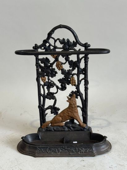 Openwork cast-iron umbrella stand decorated...