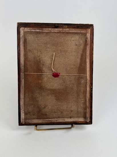 Small reliquary frame in gilded and carved...