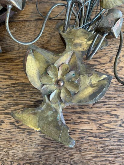 Suite of three four-light gilded metal sconces...