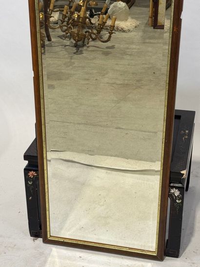 Rectangular mirror in stained wood with gilded...