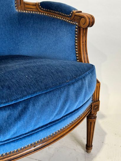 Molded and carved beech armchair, basket-handle...