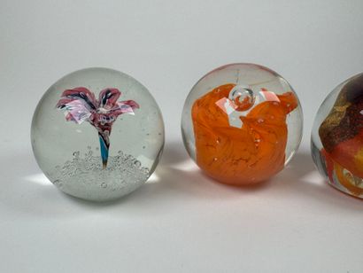 Three sulfur balls or paperweights in colored...