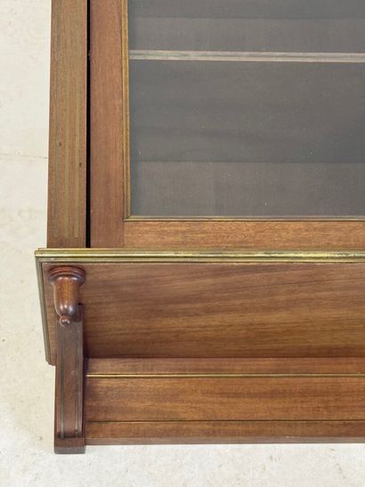 Wall-mounted display case in molded wood...