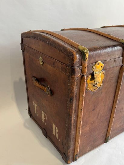 Wooden trunk, leather-covered and reinforced...