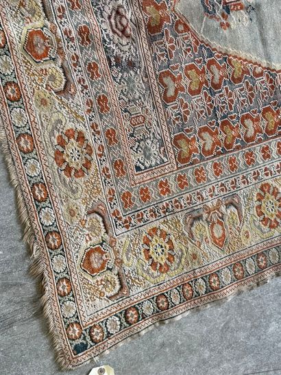 Wool and silk rug with stylized motifs. 
164...