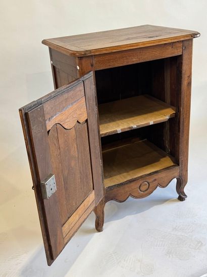 Moulded walnut jam cupboard opening with...