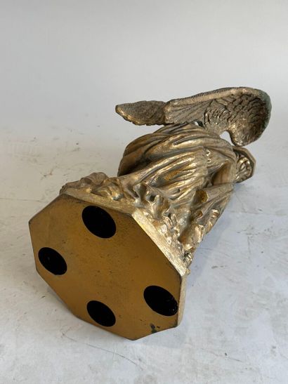 Carved and gilded wood archangel forming...