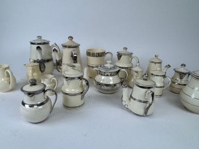 LANGEAIS.
Seventeen cream and silver-plated...