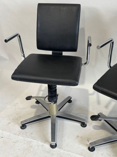 Pair of chromed metal and leather barber...