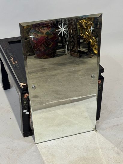 Molded and carved wood mirror with a frieze...