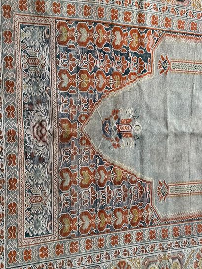 Wool and silk rug with stylized motifs. 
164...