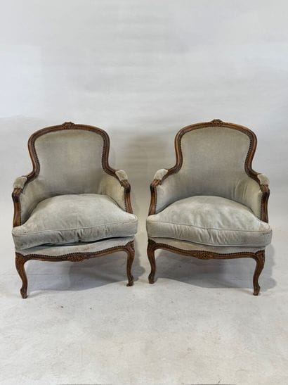 Pair of molded and carved wood bergères,...