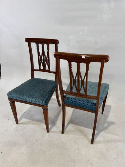 Pair of molded wood chairs with openwork...