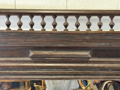 Large mirror in stained wood, the uprights...