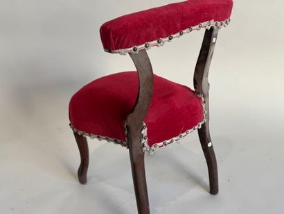 Molded wood chair with red velvet seat cover...