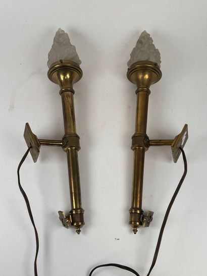 Pair of bronze sconces in the shape of a...