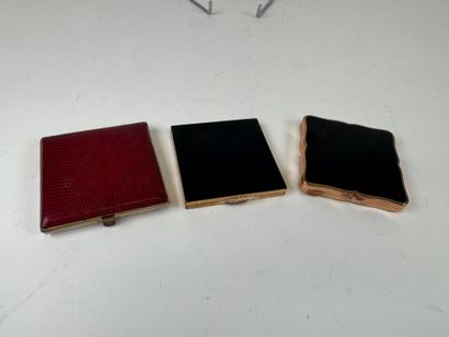 Three powder cases in gilded and lacquered...