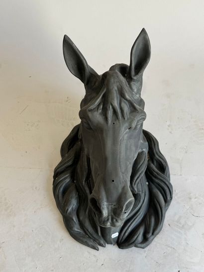 Zinc butcher's sign featuring a horse's head.
40...