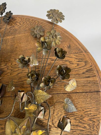 Suite of three four-light gilded metal sconces...