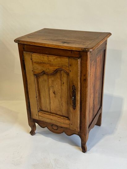 Moulded walnut jam cupboard opening with...