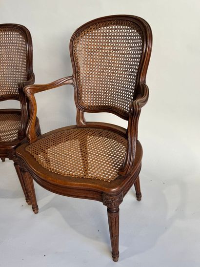 Pair of molded and carved wooden armchairs...