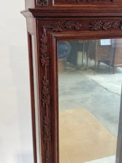 Moulded, carved and stained oak display case...