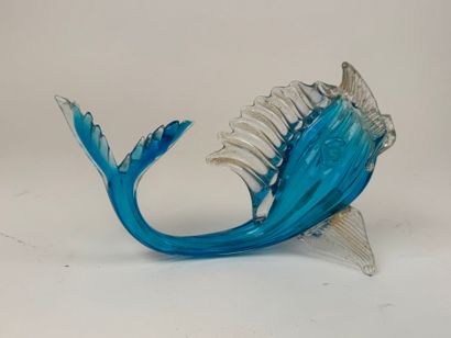 A blown glass subject, partially colored...