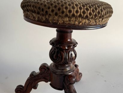 Molded and carved wooden piano stool, circular...