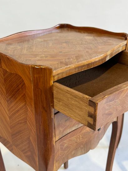A pair of Louis XV style, molded rosewood...