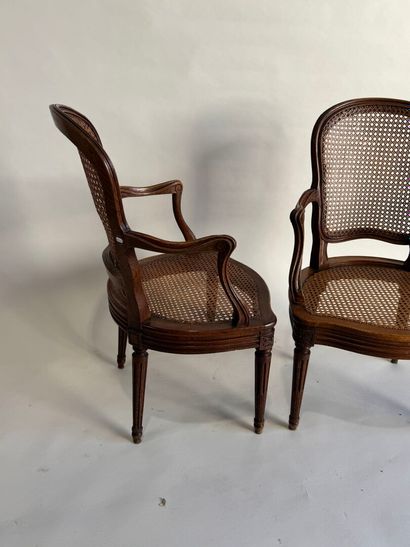 Pair of molded and carved wooden armchairs...