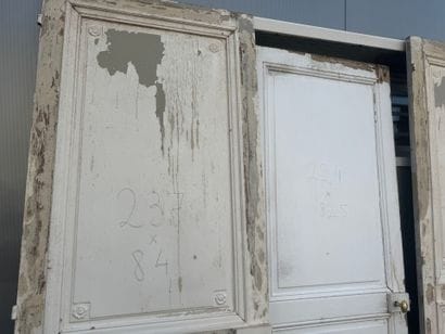 Suite of eight doors in molded and painted...