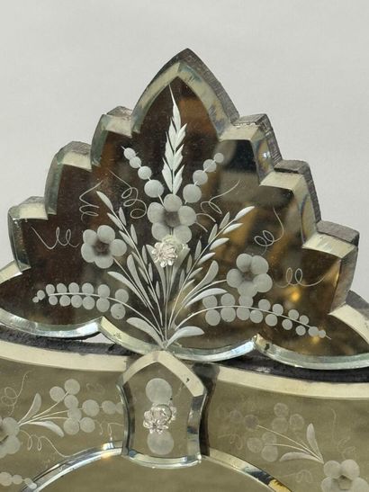 Venice mirror with beveled and chased glass...