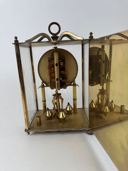 KOMA.
Brass and beveled glass table clock.
25...