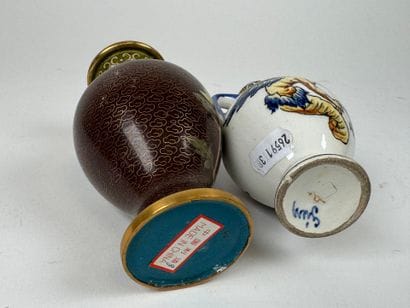 Lot including:
- GIEN.
Small polychrome earthenware...