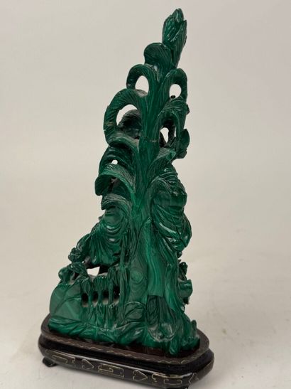 CHINA, 20th century.
Woman with flowers.
Carved...