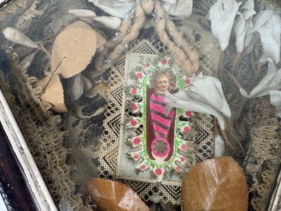 Reliquary diamond-shaped wooden frame, the...