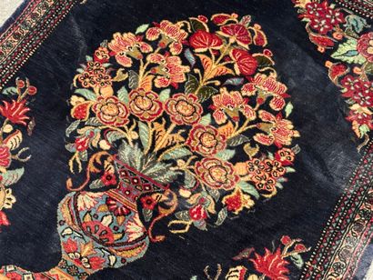 GHOUM.
Handmade silk carpet decorated with...