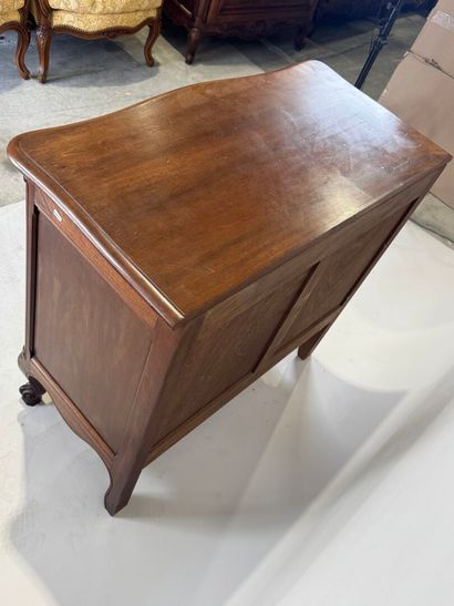 Molded wood chest of drawers opening with...