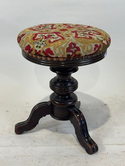 Circular tripod piano stool in molded and...