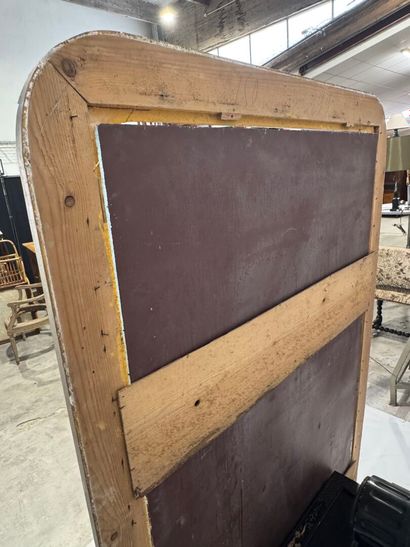 Large mirror in wood and gilded stucco decorated...