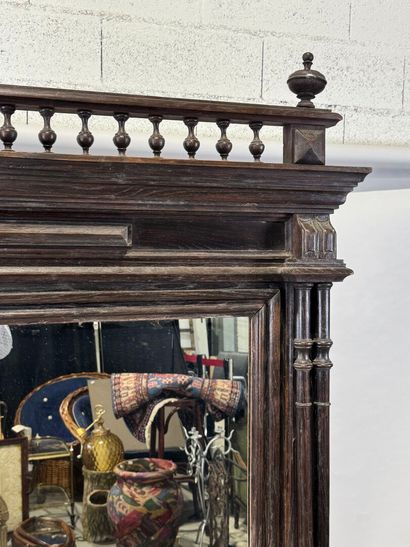 Large mirror in stained wood, the uprights...