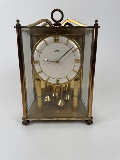 KOMA.
Brass and beveled glass table clock.
25...