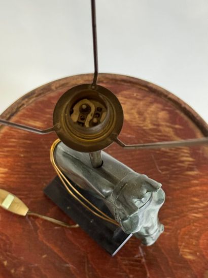 Regula lamp with green patina featuring a...