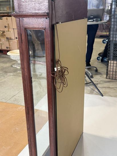 Moulded, carved and stained oak display case...