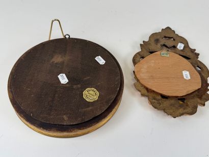 Suite of two mirrors, one of which is a circular...