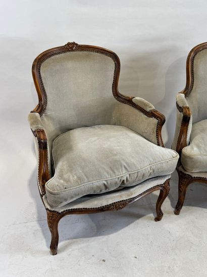 Pair of molded and carved wood bergères,...